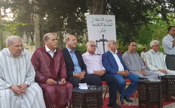 أعضاء من قيادة حزب الاستقلال في لقاء تكريمي للمفتش السايق للحزب بوزان 